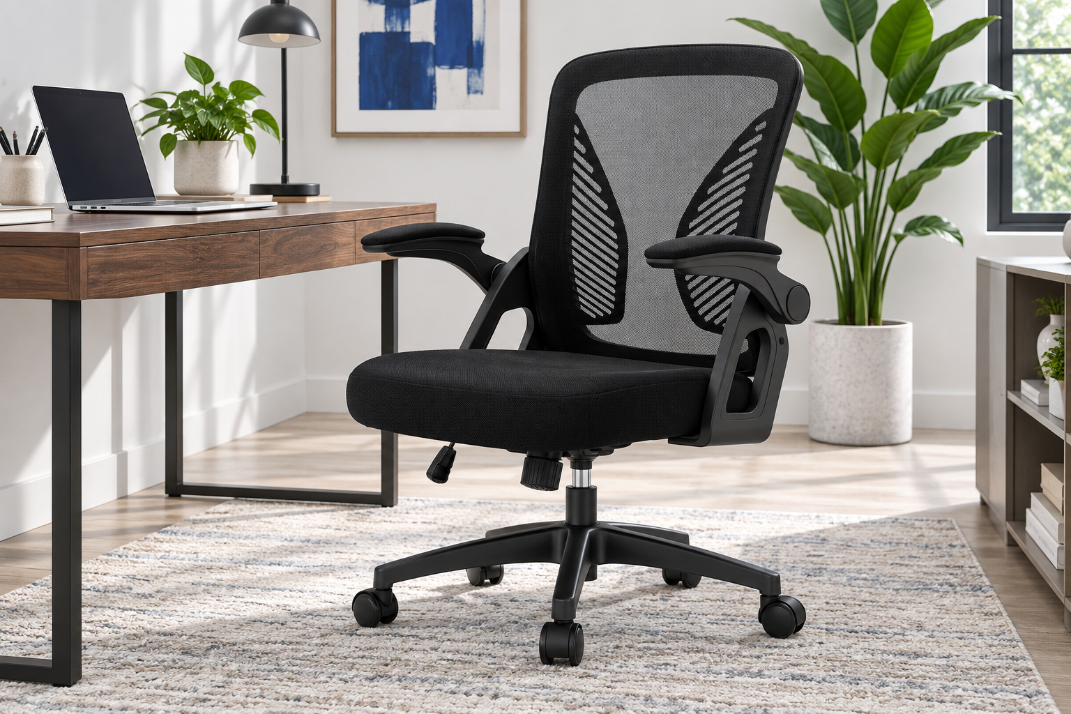 Room Study styling image of the Durrafy Mesh Office Chair with Flip-Up Arms, Black in a bright home workspace; other furnishings and accessories shown for styling.