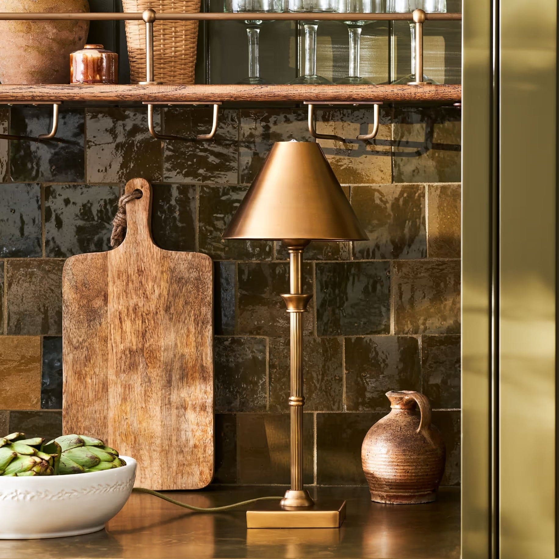 Kelmscot table lamp in antique brass, retailer photograph
