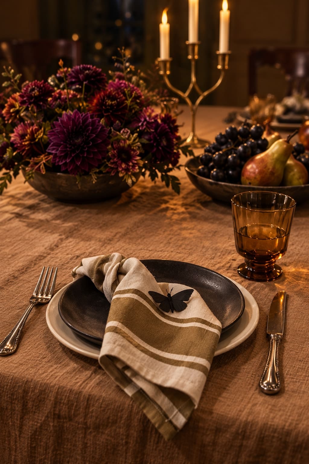 A paper moth makes a small interruption at the place setting. Lift it away before the meal begins.
