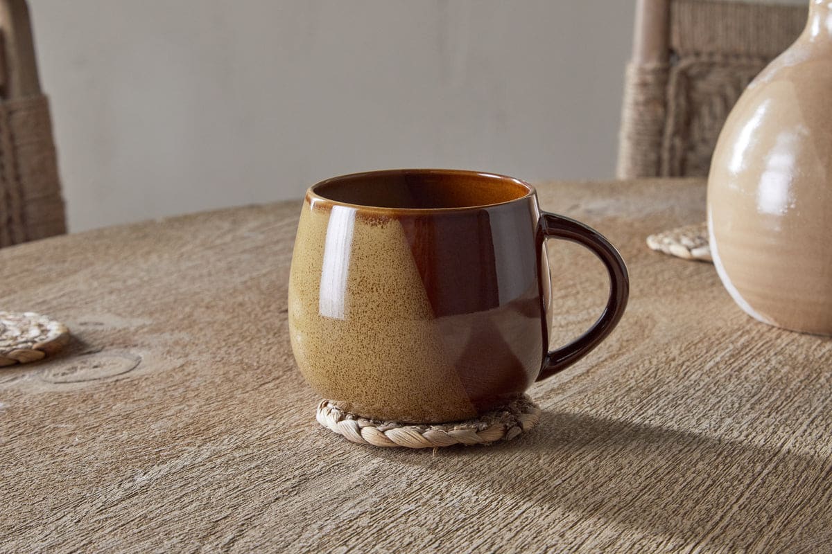 Naav extra-large mug in mustard, retailer photograph