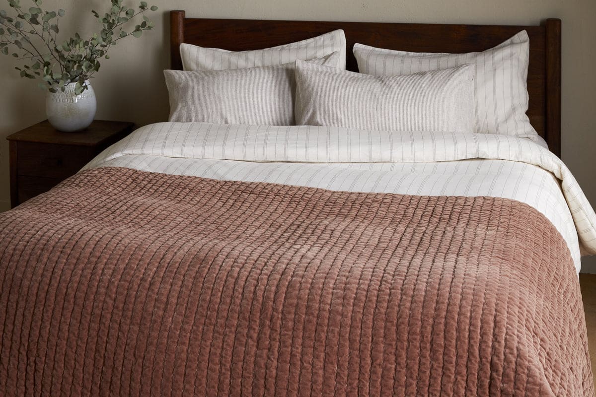 nkuku Nidra Velvet & Linen Bed Quilt | Textiles | Rust | 220 x 240 cm, retailer reference photograph