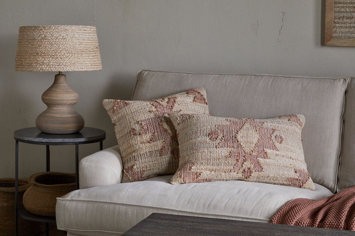 Nila Gul cushion cover in rust, retailer photograph